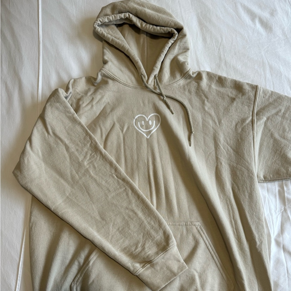 women’s self love hoodie in a cute clay/taupe color. in excellent condition
